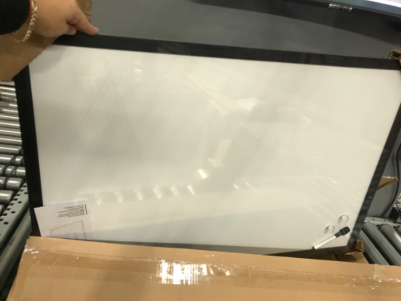 Photo 2 of Amazon Basics Magnetic Dry Erase White Board, 23 x 17-Inch Whiteboard - Black Wooden Frame
