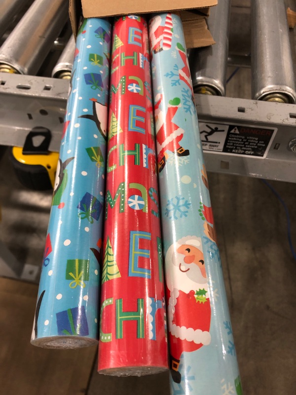 Photo 2 of Hallmark Cute Reversible Christmas Wrapping Paper for Kids (3 Rolls: 120 sq. ft. ttl) Penguins, Santa, Trees, Stripes, Snowflakes, "Merry Christmas" Family Christmas