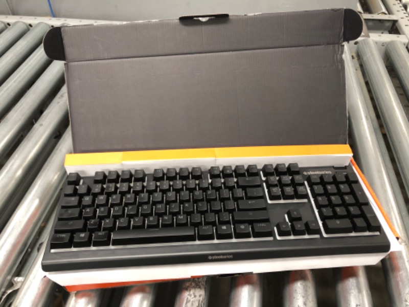 Photo 2 of SteelSeries Apex 3 RGB Gaming Keyboard – 10-Zone RGB Illumination – IP32 Water Resistant – Premium Magnetic Wrist Rest (Whisper Quiet Gaming Switch)