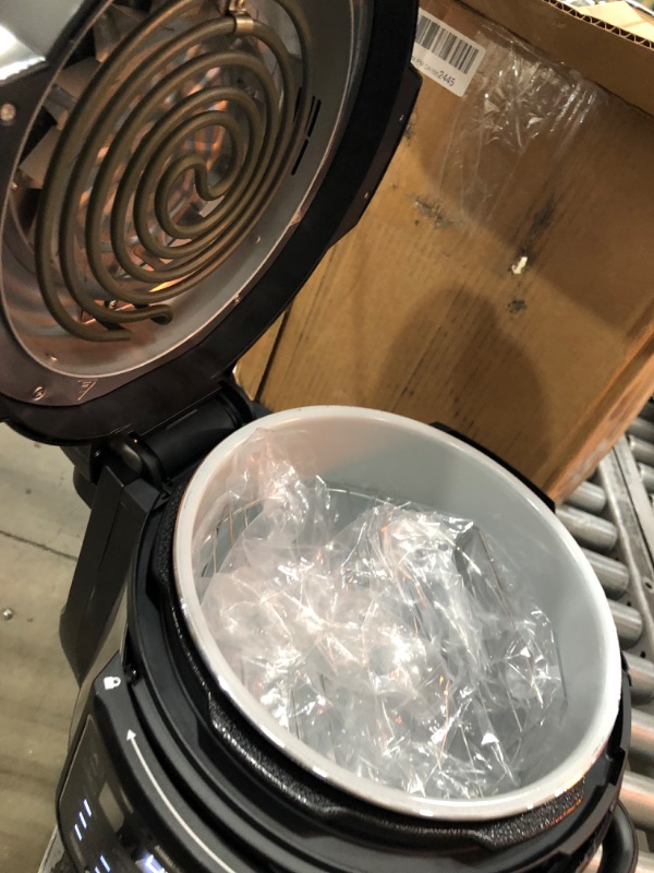 Photo 1 of Ninja OS401 Foodi 10-in-1 XL 8 qt. Pressure Cooker & Air Fryer that Steams, Slow Cooks, Sears, Sautés, Dehydrates & More, with 5.6 qt. Cook & Crisp Plate & 15 Recipe Book, Silver
