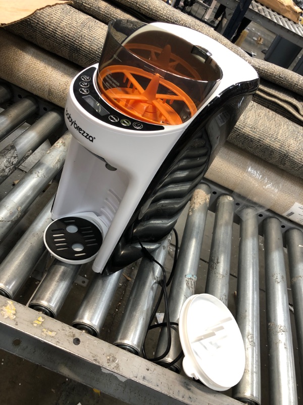 Photo 1 of New and Improved Baby Brezza Formula Pro Advanced Formula Dispenser Machine - Automatically Mix a Warm Formula Bottle Instantly - Easily Make Bottle with Automatic Powder Blending