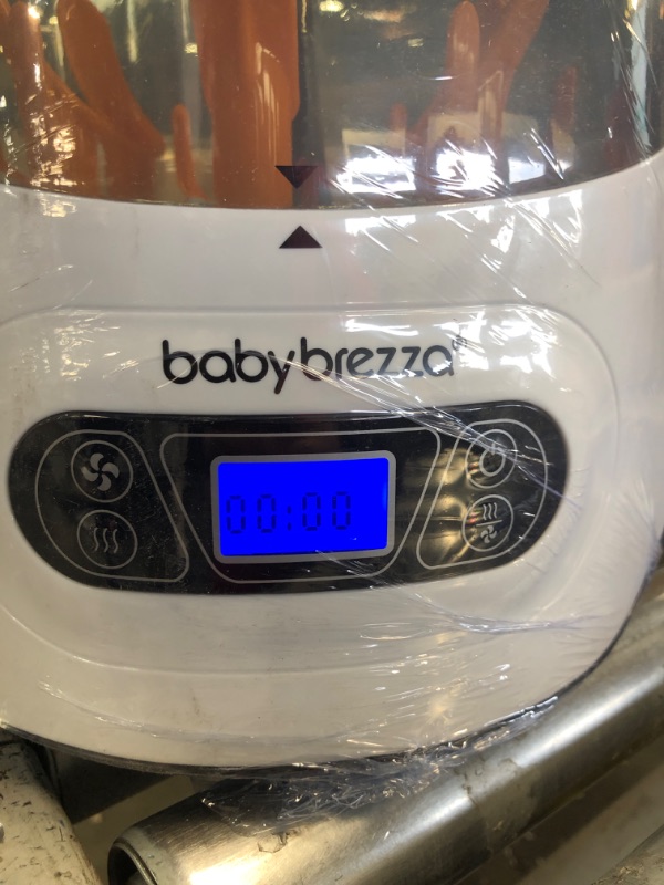 Photo 3 of Baby Brezza Baby Bottle Sterilizer and Dryer Machine – Electric Steam Sterilization - Universal Fit - Pacifiers, Glass, Plastic, and Newborn Feeding Bottles
