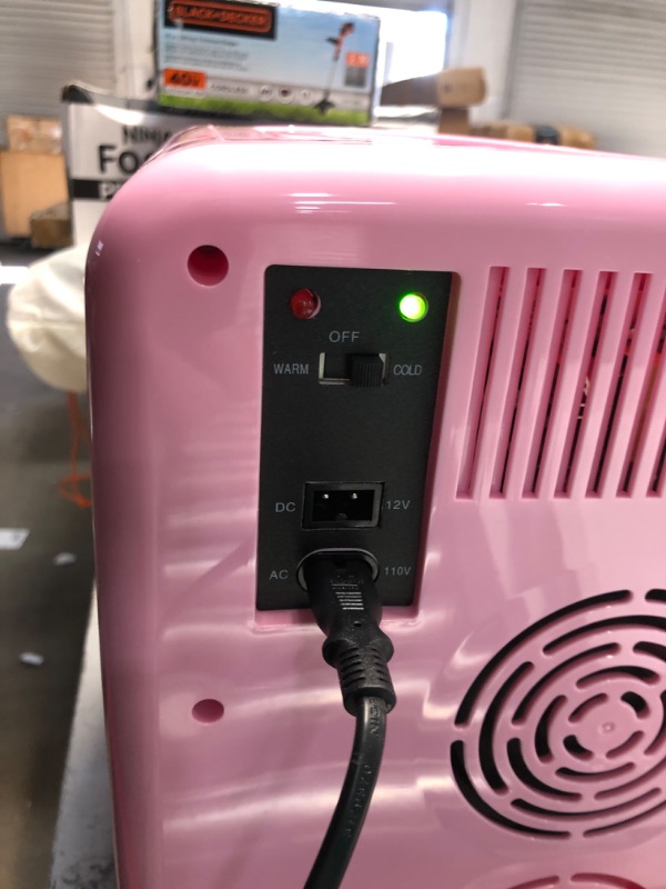 Photo 1 of CROWNFUL Mini Fridge, 10 Liter/12 Can Portable Cooler and Warmer Personal Fridge for Skin Care, Food, Medications, Great for Bedroom, Office, Dorm, Ca
