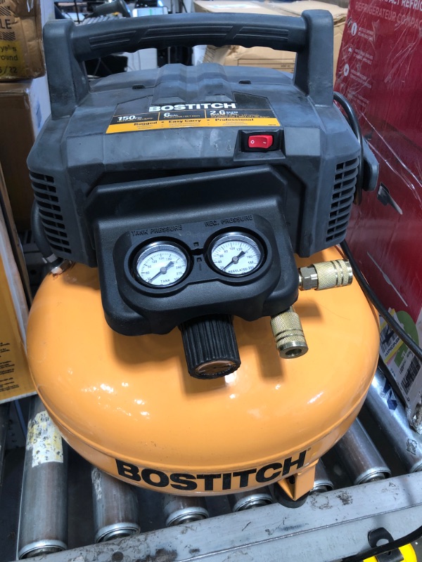 Photo 2 of ***HAS A SLOW LEAK*** BOSTITCH BTFP02012 6-Gallon Pancake Compressor