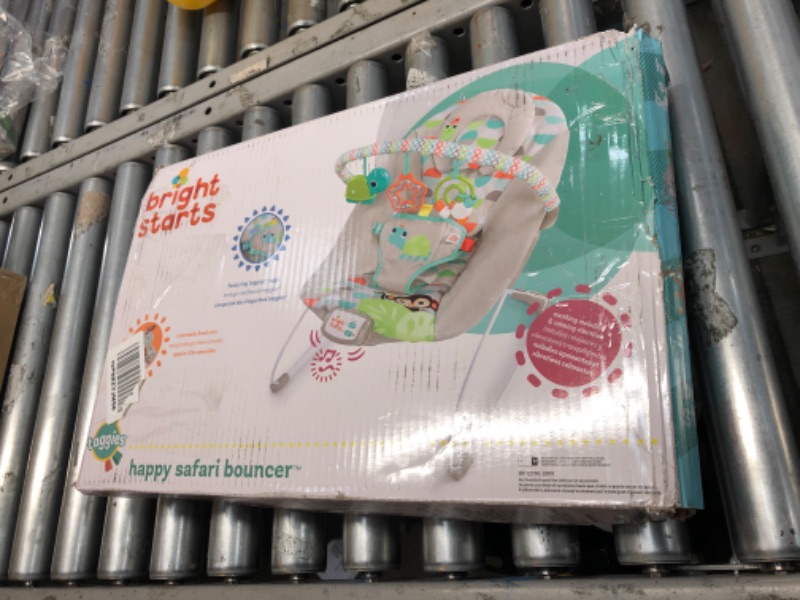 Photo 2 of Bright Starts Happy Safari Vibrating Baby Bouncer Seat with 3-Point Harness and Bar, Age 0-6 Months
