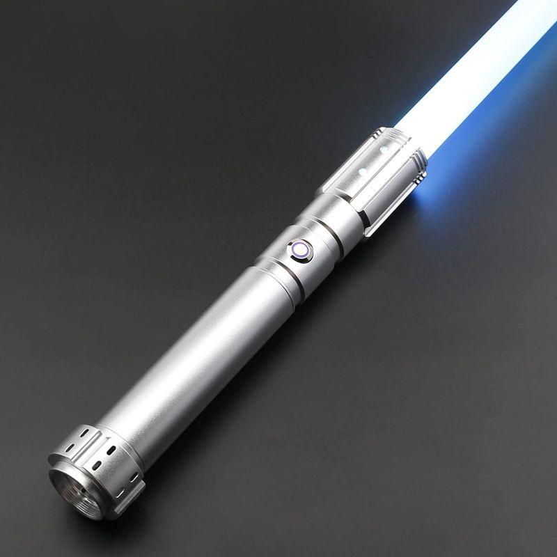 Photo 1 of X-TREXSABER Light Saber Smooth Swing 12 RGB LED,10 Fonts Blaster Sound, FX Light Sabers Heavy Dueling Aluminum Hilt Sword Toys for Cosplay Silver Hilt E28

**missing components 