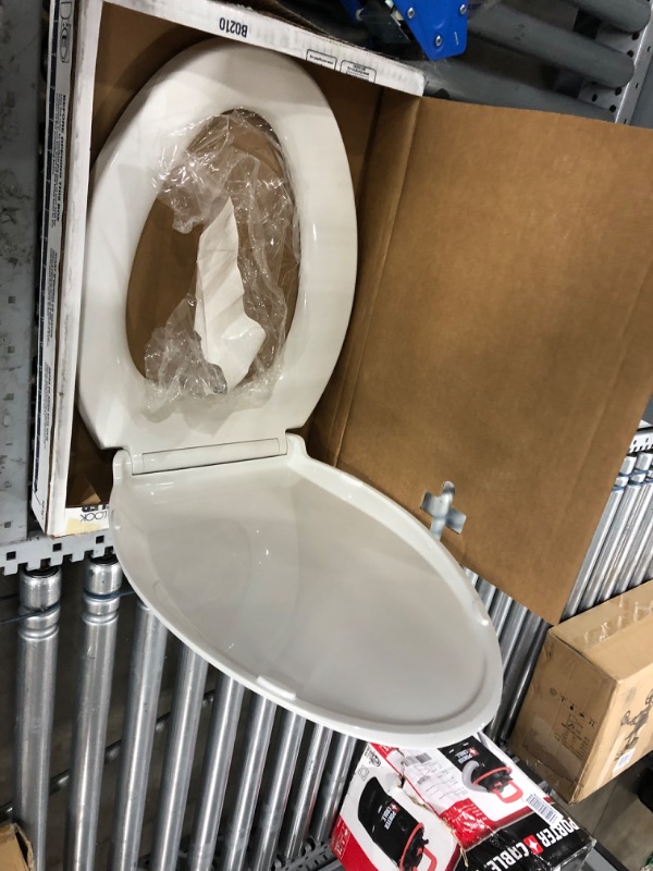 Photo 4 of **parts only, damaged, missing hardware**
Kohler 4636-0 Cachet Quiet-Close with Grip-Tight Elongated Toilet Seat - White