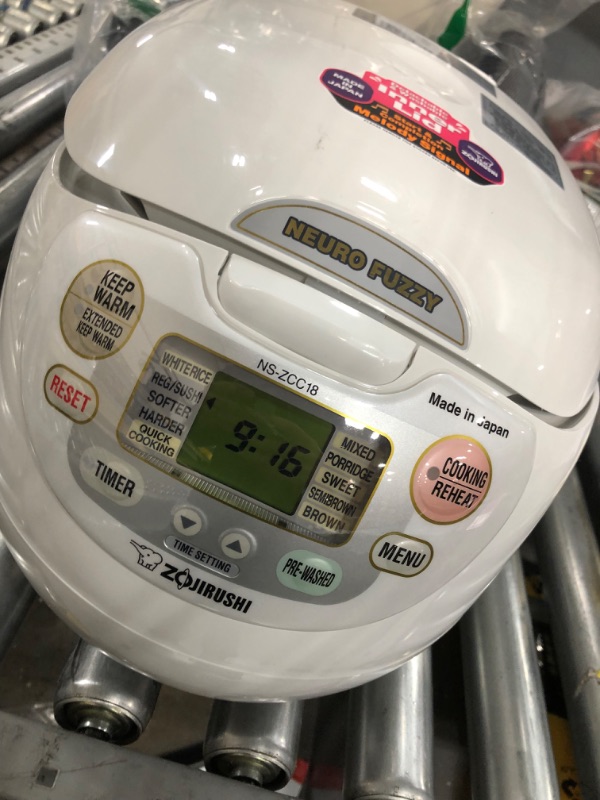 Photo 2 of **damaged, view photos**
Zojirushi NS-ZCC18 Neuro Fuzzy Rice Cooker & Warmer, 10 Cup, Premium White, Made in Japan
