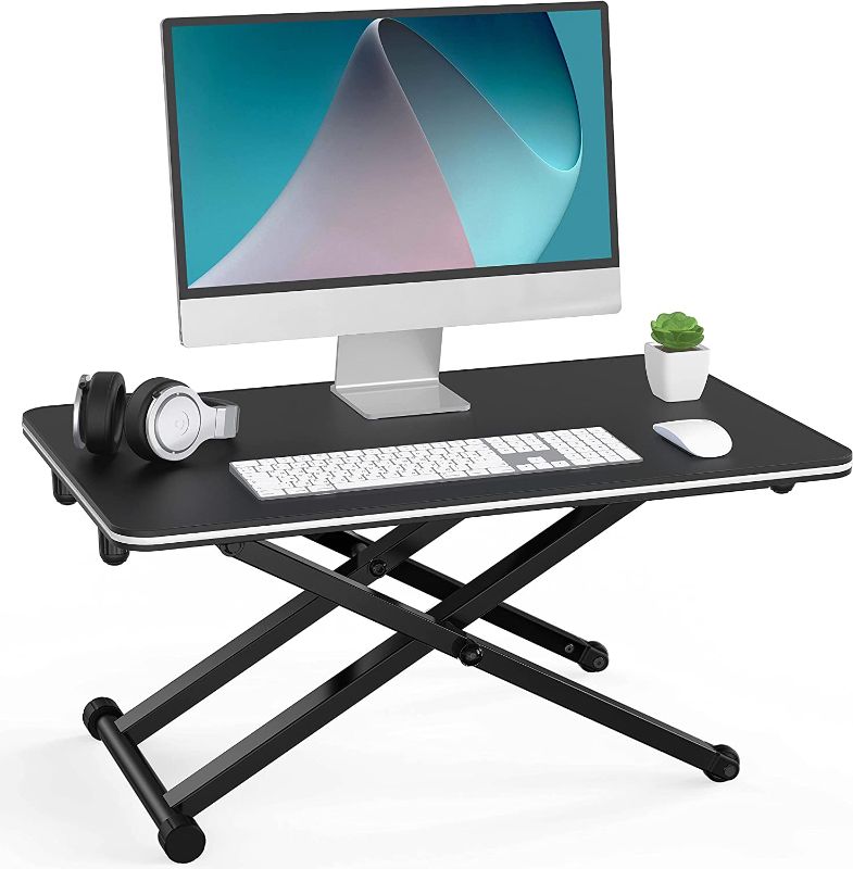 Photo 1 of Fenge Standing Desk for Laptop Desktop Sit to Stand Up Desk Conventer for Single Monitor SD255001WB
