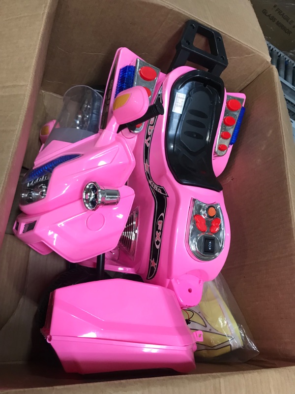 Photo 2 of (does not function)Lil' Rider Electric Motorcycle for Kids – 3-Wheel Battery Powered Motorbike for Kids Ages 3 -6 – Fun Decals- Reverse- and Headlights (Pink)
**did not power on**
