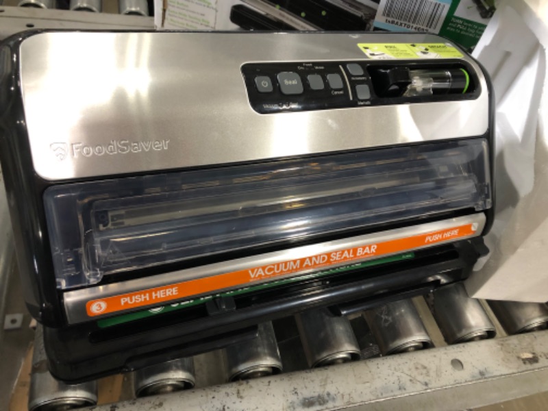 Photo 1 of 2-in-1 Black/Stainless Steel Vacuum Sealer System with Starter Kit