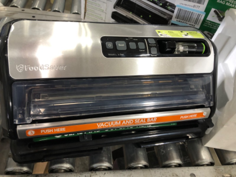 Photo 1 of 2-in-1 Black/Stainless Steel Vacuum Sealer System with Starter Kit