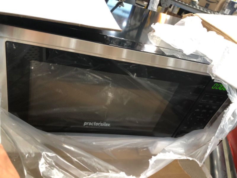 Photo 2 of Proctor Silex 1.1 cu ft 1000 Watt Microwave Oven - Stainless Steel

