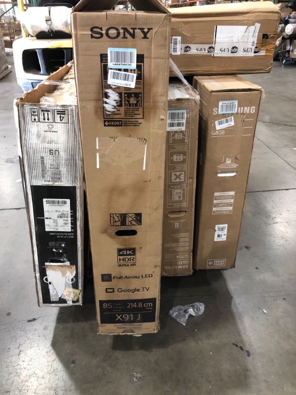 Photo 1 of MIXED PALLET OF DAMAGED TVS AND MONITORS**5 UNITS**NON FUNCTIONAL NO REFUNDS**