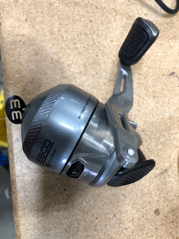 Photo 2 of **MINOR DAMAGE TO HANDLE** Zebco 33 Platinum Spincast Reel, 5 Ball Bearings (4 + Clutch), Instant Anti-Reverse with a Smooth Dial-Adjustable Drag, Powerful All-Metal Gears and Spooled with 10-Pound Cajun Line

