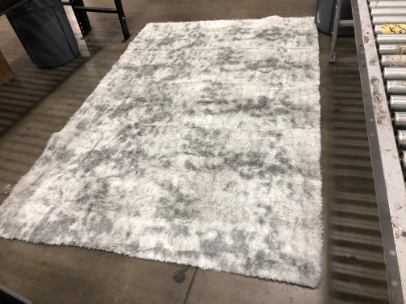 Photo 3 of **USED-NEEDS CLEANING**
6 X 9 SOFT FLUFFY GREY/BLACK RUG**VIEW PHOTOS**

