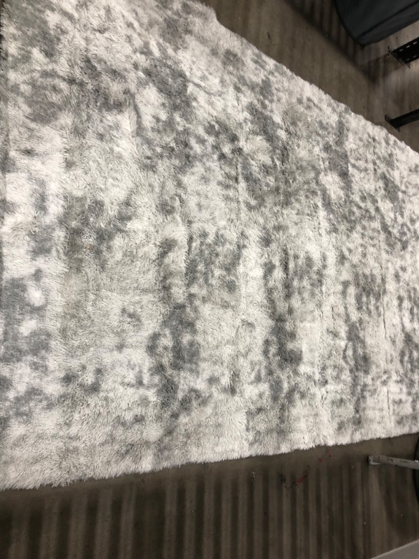 Photo 5 of **USED-NEEDS CLEANING**
6 X 9 SOFT FLUFFY GREY/BLACK RUG**VIEW PHOTOS**
