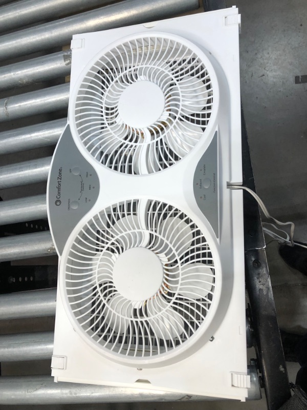 Photo 2 of CZ310R Reversible Twin Window Fan with Remote
