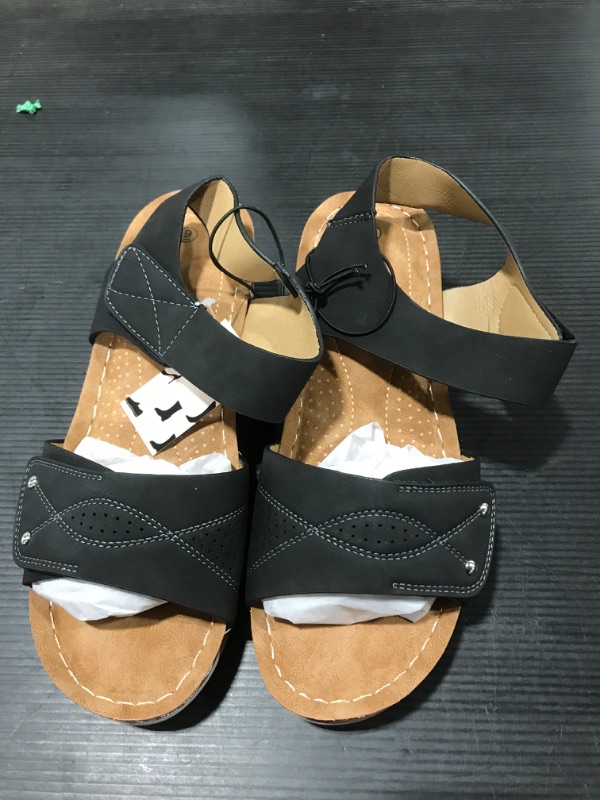 Photo 1 of BLACK WOMEN SANDALS 
SIZE 10