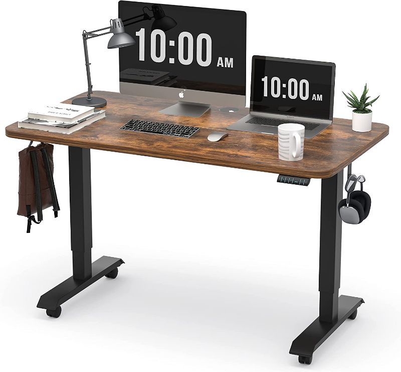 Photo 1 of MONOMI Electric Height Adjustable Standing Desk, 48x24 Inches Stand Up Desk, Ergonomic Home Office Sit Stand Desk (Black Steel Frame/Rustic Brown Top)
