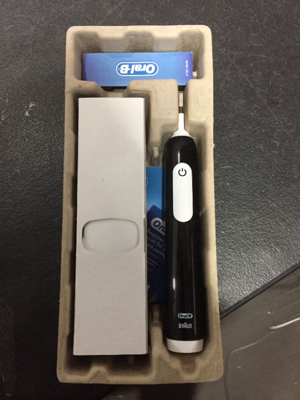 Photo 2 of Oral-B Pro 1000 CrossAction Electric Toothbrush, Black
