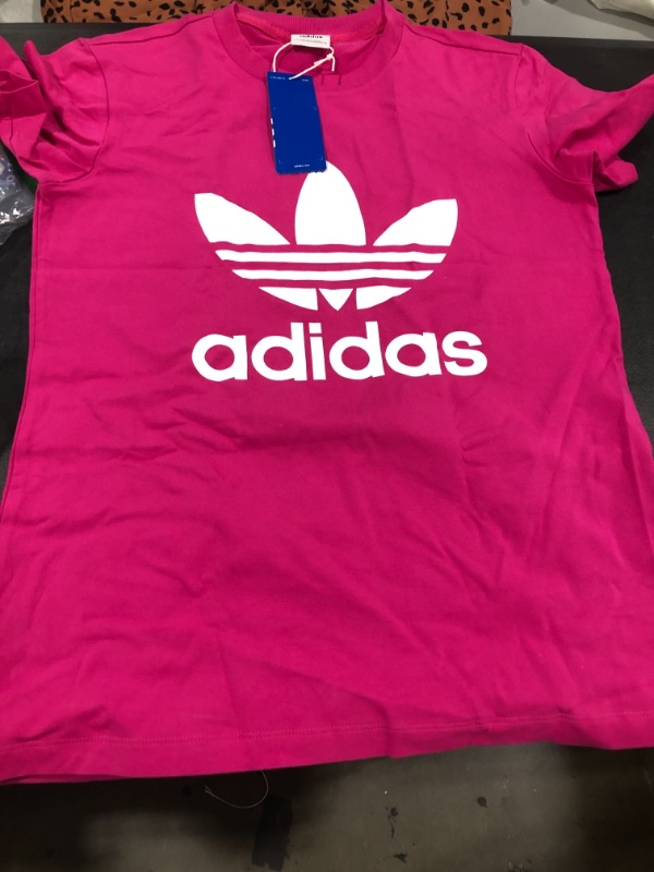 Photo 1 of adidas shirt unknown size looks like a small