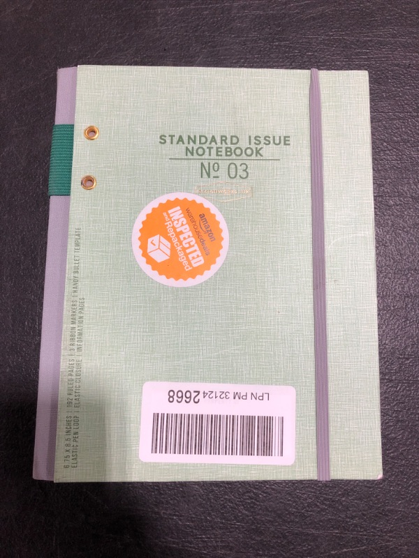 Photo 1 of STANDARD ISSUE NOTEBOOK. 