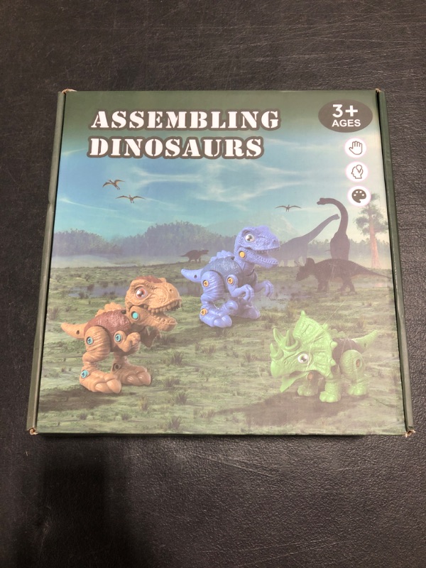 Photo 1 of ASSEMBLING DINOSAURS TOY, AGES 3+. NEW IN BOX. 
