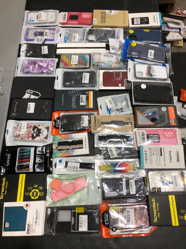 Photo 1 of LOT OF ASSORTED SMARTPHONE CASES & ACCESSORIES. STYLES & APPLICATIONS VARY. NEW & PRIOR USE ITEMS MAY BE PRESENT. 