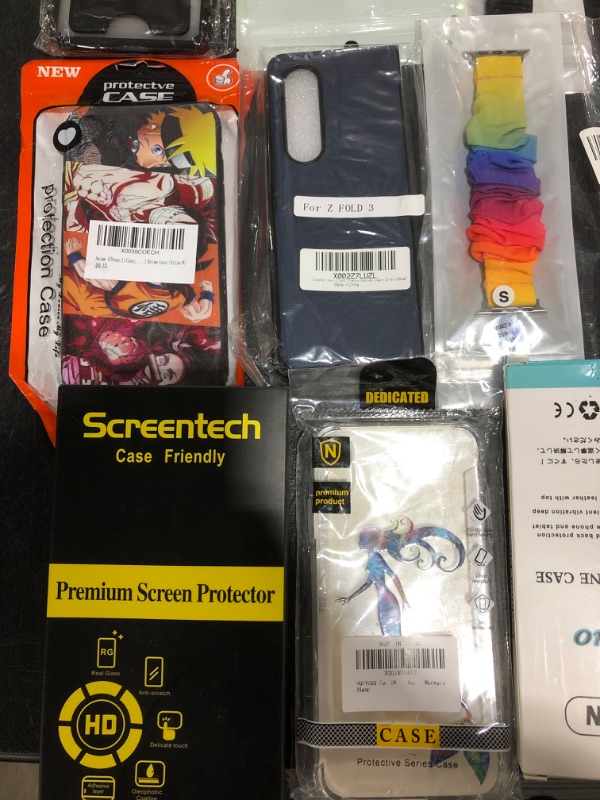 Photo 2 of LOT OF ASSORTED SMARTPHONE CASES & ACCESSORIES. STYLES & APPLICATIONS VARY. NEW & PRIOR USE ITEMS MAY BE PRESENT. 