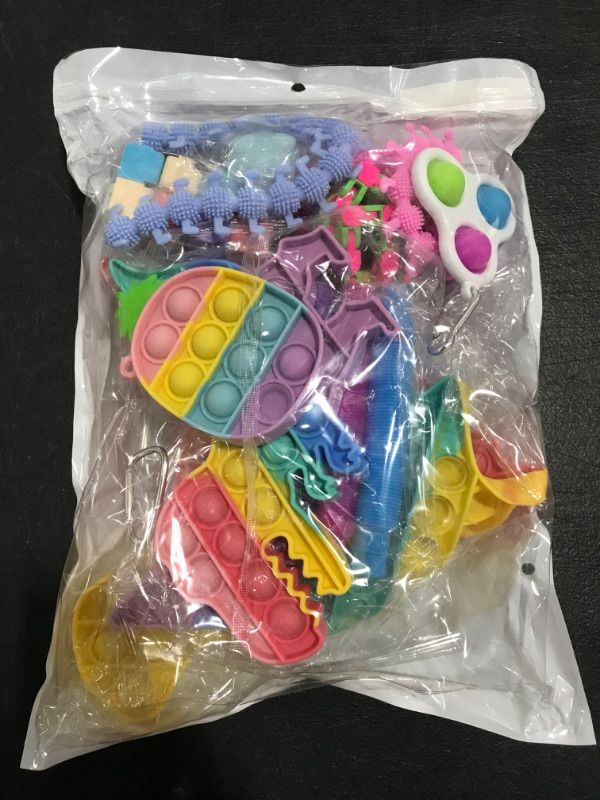 Photo 1 of CHILDREN'S FIDGET & SENSORY TOYS. 22 PIECES. COLORS & ITEMS VARY. 