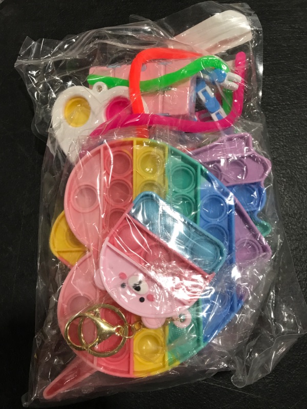 Photo 1 of ASSORTED FIDGET & SENSORY TOY MULTI-PACK. 18 PIECES. ITEMS WILL VARY. 