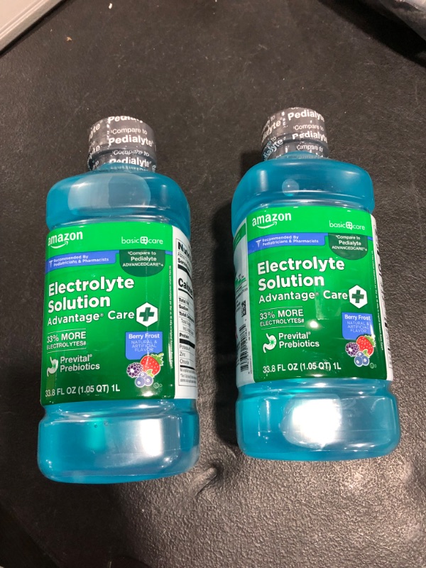 Photo 1 of 2 BOTTLES AMAZON ELECTROLYTE  BERRY FROST 
EXP JAN20/2023