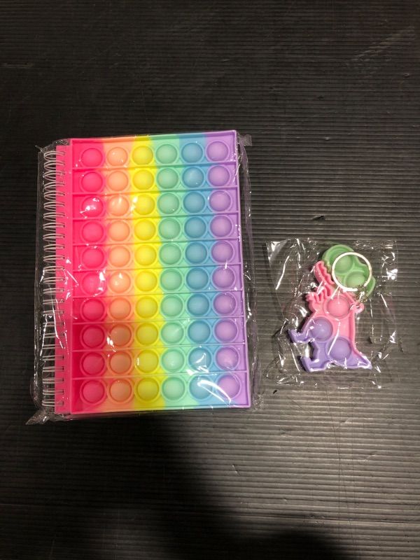 Photo 2 of Pop Notebook with Cute Keychain Rainbow Pop on It Journal Bubble Notebook for Girls Portable Relieve Stress Fidget Notebook Toy Pop Bubble Notebook for Kids Adults Fidget Notebook for School Office