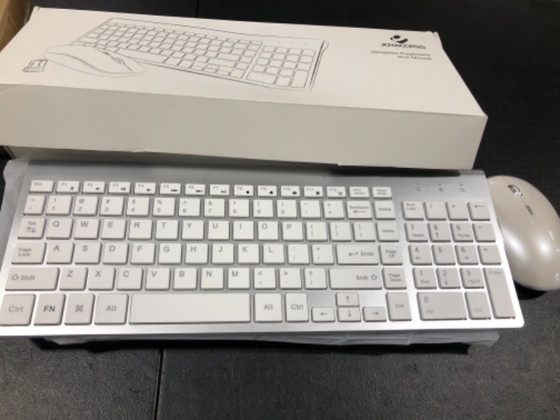 Photo 1 of Wireless Keyboard and Mouse Combo,J JOYACCESS 2.4G Slim Wireless Keyboard Mouse-Portable, Full Size, Ergonomic, 2400 DPI,Extreme Power Saving,Sleek Design-White+Silver
