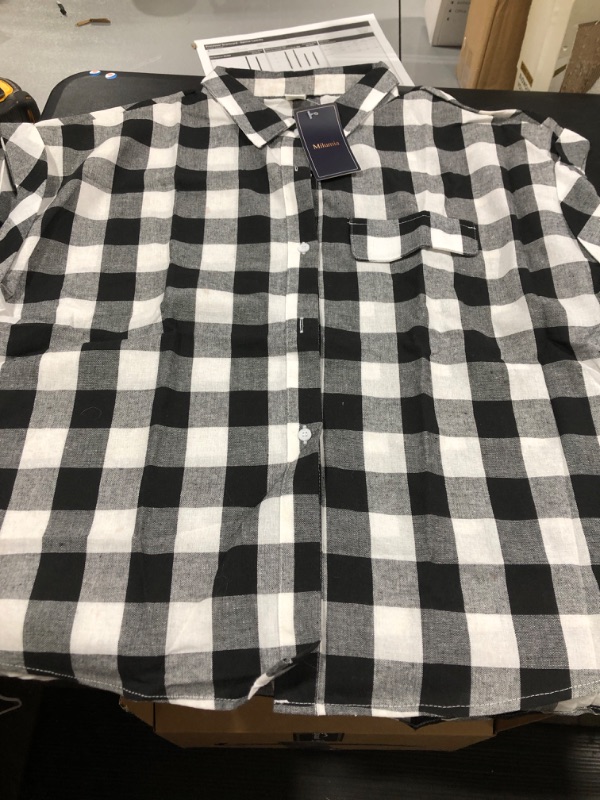 Photo 1 of BLACK AND WHITE CHECKERED BUTTON UP VEST SIZE L 