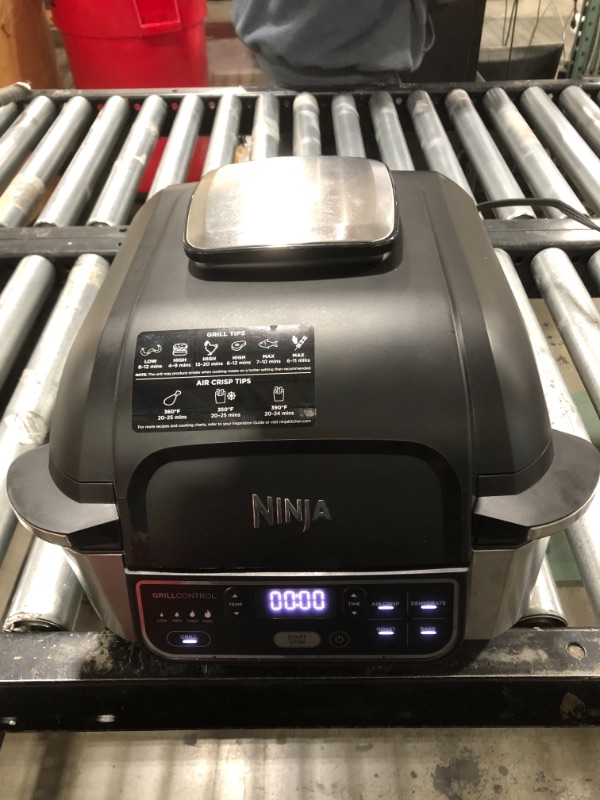 Photo 2 of Ninja Foodi 5-in-1 Indoor Grill with 4-Quart Air Fryer, Roast, Bake, Dehydrate, and Cyclonic Grilling Technology, AG301
