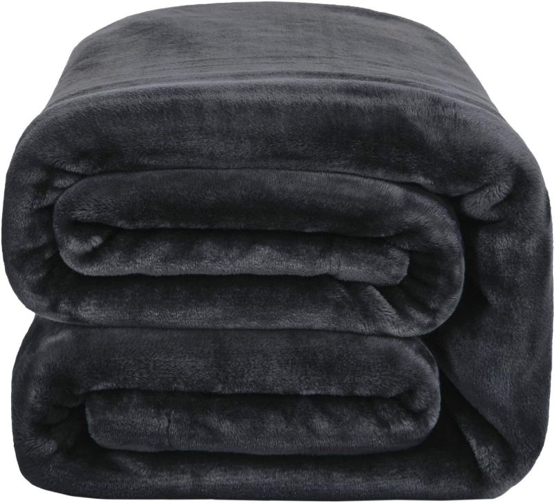 Photo 1 of Bedsure Fleece Throw Blanket, Thick Warm Throws Twin Size, Fuzzy Soft Blankets for Bed and Sofa,Black, 90x90 Inches
