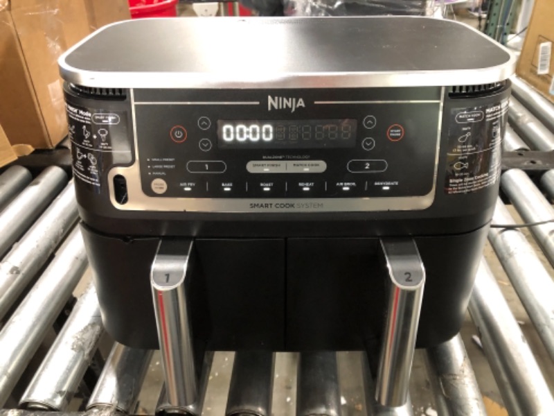 Photo 1 of Ninja DZ401 Foodi 10 Quart 6-in-1 DualZone XL 2-Basket Air Fryer with 2 Independent Frying Baskets, Match Cook & Smart Finish to Roast, Broil, Dehydrate & More for Quick, Easy Family-Sized Meals, Grey
