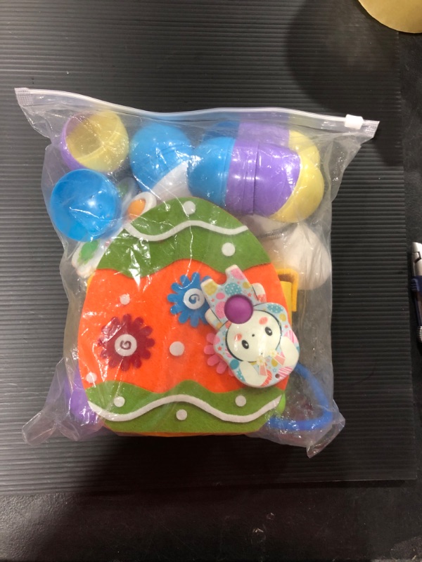 Photo 1 of EASTER BASKET AND PLASTIC EGGS WITH SOME TOYS 