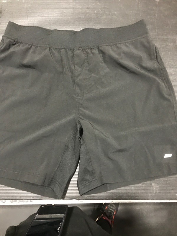 Photo 1 of amazon essentials black shorts 
large 