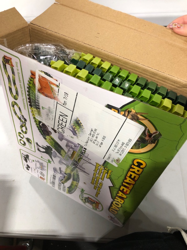 Photo 1 of Dinosaur Toys, Create A Race Car Track Dino World with Flexible Track and 2 Cool Cars, Best Gift for Toddler Kids Boys Girls Age 3 4 5 6 7 Year Old

