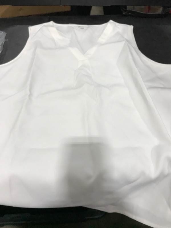 Photo 1 of  White sleeveless shirt for women Size L