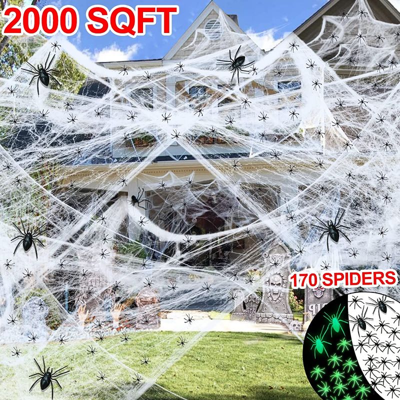 Photo 1 of 2000 Sqft Halloween Spider Web Decorations with 170 Fake Plastic Spiders Glow in the Dark Spider, Super Stretch Cobweb for Halloween Decor Outdoor Indoor Home Party Supplies Yard Haunted House
