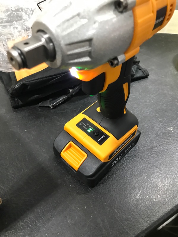 Photo 3 of Adedad Cordless Impact Wrench 1/2 inch, 20V Brushless Impact Gun with Battery and Charger, High Torque 250 ft-lbs 3000 RPM Impact Wrench with 1-Hour Fast Charger, Led Light 2.0Ah Battery- MISSING 5 ITEMS; ADAPTER, 2 SCREWDRKVER BITS, 2 HEX NUT DRIVERS
