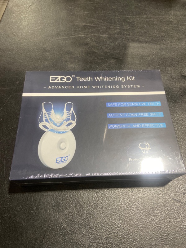 Photo 2 of EZGO Teeth Whitening Kit with LED Light, 5 X LED Fast-Result Teeth Whitener with Carbamide Peroxide Teeth Whitening Gel, Non-Sensitive Tooth Whitening Kit Remove Stains from Coffee and Soda (blue kit) 1 Count (Pack of 1)
SEALED 