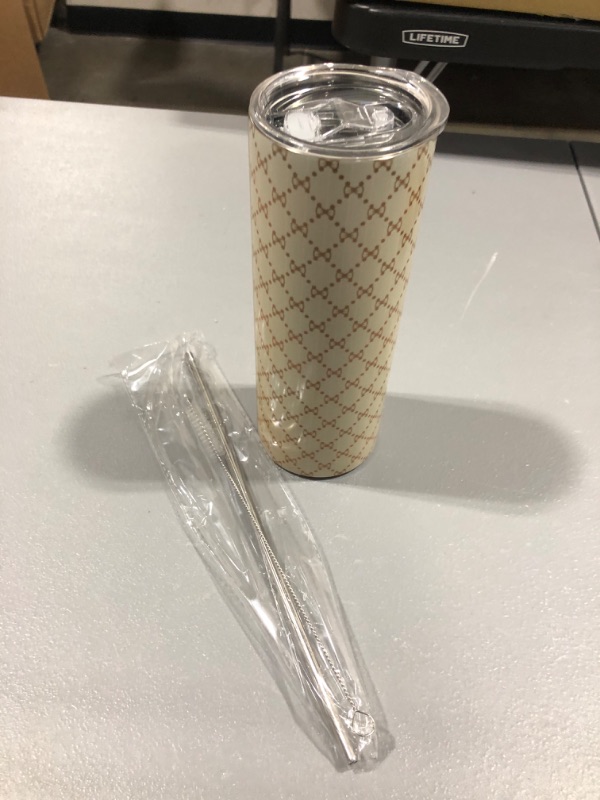 Photo 1 of 20 Oz Skinny Tumbler with metal straw