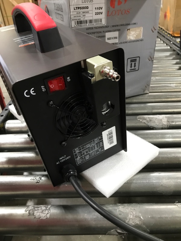 Photo 1 of Lotos Technology LTP5000D 50Amp Non-Touch Pilot Arc Plasma Cutter, Dual Voltage 110V/220V, 1/2 Inch Clean Cut, Brown
