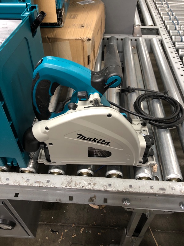 Photo 2 of **BOX 1 of 2***
Makita SP6000J1 6-1/2-Inch 12.0 Amp Plunge Circular Saw with Guide Rail