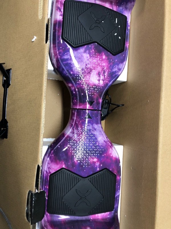 Photo 2 of Hover-1 Helix Electric Hoverboard | 7MPH Top Speed, 4 Mile Range, 6HR Full-Charge, Built-in Bluetooth Speaker, Rider Modes: Beginner to Expert Hoverboard Galaxy